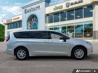 This Chrysler Grand Caravan has a strong Regular Unleaded V-6 3.6 L/220 engine powering this Automat... (image 5)