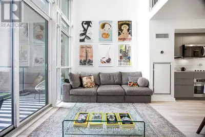 Imagine waking up to warm morning light streaming through soaring floor-to-ceiling windows in your t...