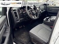 Presenting the stunning 2023 Ram 1500 Classic SLT 4x4 Crew Cab in an elegant White finish, paired wi... (image 8)