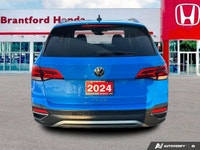 Command the urban landscape with this 2024 Volkswagen Taos Comfortline. Finished in striking Cornflo... (image 4)