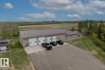 Escape to peace, privacy, and endless possibility with this truly unique acreage. Zoned Heavy Indust...