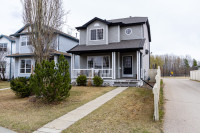 Home backing onto greenspace in Devon | Schmidt Realty Group