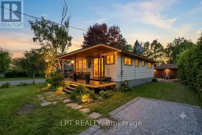 Dreaming of the ultimate waterfront lifestyle? Welcome to this stunning Ramara bungalow where Lake S...