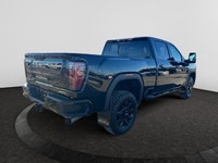 Welcome to Capital GMC! This 2026 GMC Sierra 3500HD AT4 Capital Custom Lift Truck in Onyx Black is e... (image 4)