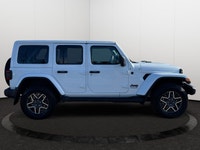 This 2026 JEEP WRANGLER 4-DOOR SAHARA has the following options Cloth Low-Back Bucket Seats, Remote... (image 5)