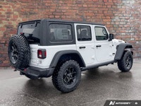 This Jeep Wrangler delivers a Regular Unleaded V-6 3.6 L/220 engine powering this Automatic transmis... (image 4)