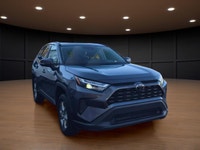 Price includes $1,000 finance credit. Price does not include fees or taxes. The 2023 Gray Toyota RAV... (image 2)