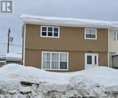 Great starter or family home! Four-bedroom end-unit row house located on Tamarack Drive—these units...