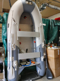 Inflatable boat repairs with professional glue and material