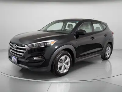 The 2016 Hyundai Tucson in elegant black with a reliable Front-Wheel Drive system offers an impressi...