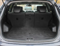 Introducing the 2022 Buick Encore Preferred AWD, a striking black SUV that combines all-wheel drive... (image 6)