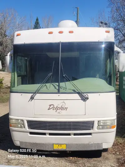 Red Deer, Alberta. 2004 National Dolphin Built upon a 8.1 Workhorse chassis Corian counter top, Show...