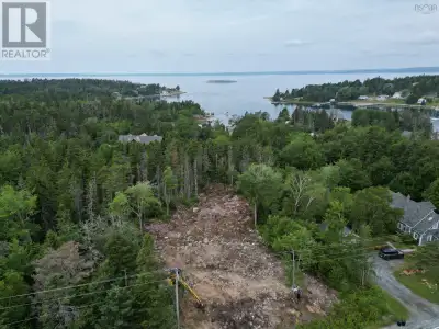 Vacant land MU2 Zoned- Ready to build your home with a walkout basement or many possibilities with c...