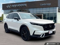The 2026 Honda CR-V Hybrid Touring isn't just an SUV; it's your efficient and sophisticated partner... (image 6)