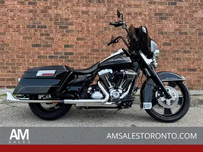 SUPER cool Canadian Road King with over $6,000 in upgrades and extras! Custom black wheels front and...