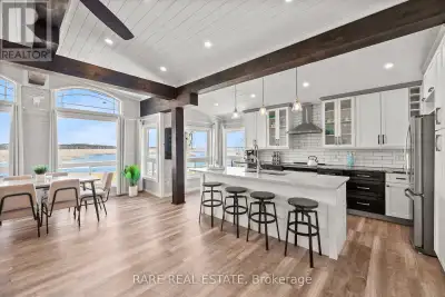 Escape to the tranquility of Pigeon Lake with this stunning four-season waterfront home a perfect bl...