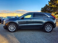 Experience driving sophistication with this 2021 Cadillac XT4 AWD Luxury, presented in a stunning Gr... (image 4)