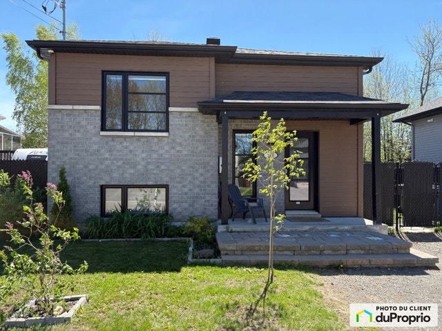 $459,900 - Raised Bungalow for sale in St-Lin-Laurentides — photo 1