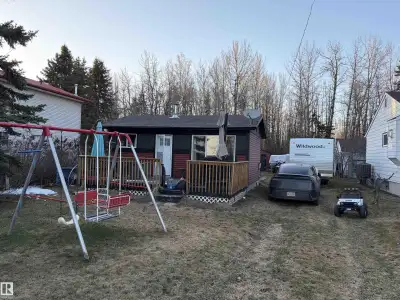 Experience rare lakefront value at Mission Beach. This turnkey, four-season cabin sits on a 50’ x 15...