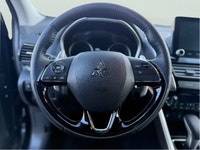 The 2024 Mitsubishi Eclipse Cross in a striking black finish is designed to tackle any road with its... (image 6)