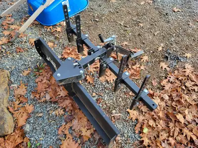 Camco black boar scrape blade implement. Comes with manual lift and chisel plow implements. Mounts t...