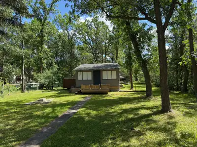 Looking for a Weekend getaway steps away from the Lake Winnipeg on a affordable budget? Welcome to 2...
