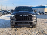 The 2026 Ram 1500 Big Horn Crew Cab in Granite Crystal Metallic combines rugged capability with refi... (image 9)