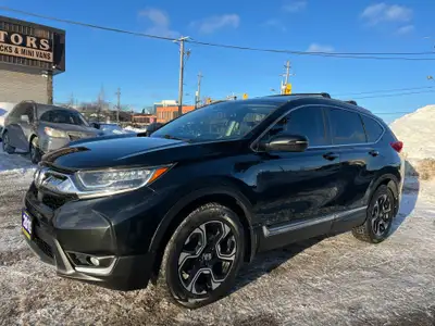 Now available at Eli Motors, this CR-V Touring all-wheel-drive SUV blends luxury, utility, and advan...