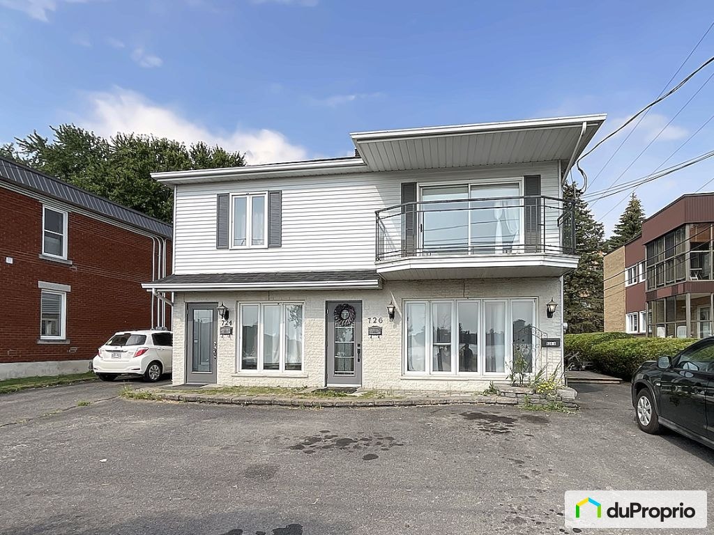 $915,000 - Triplex for sale — photo 1