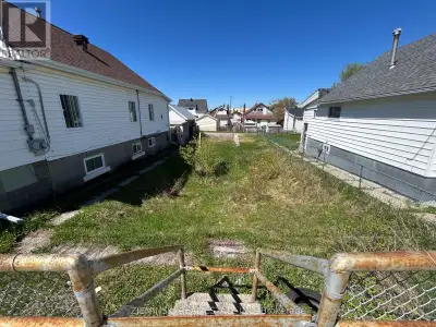 Located in Schumacher, this lot is situated in a residential neighbourhood. A back laneway adds extr...