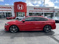Experience the thrill of driving the 2023 Honda Civic Sedan Touring, a certified pre-owned beauty wi... (image 7)