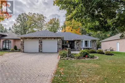 This meticulously maintained bungalow, proudly owned by the original owners, offers a spacious and i...