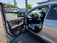"• Power_Windows • Power_Seat • Power_Mirrors • Power_Locks • Keyless_Entry • Air_Conditioning • Til... (image 8)