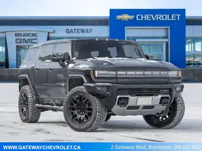 The 2024 GMC HUMMER EV SUV 2X commands attention with an electrified, wide-body stance that blends b...