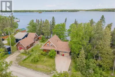 Escape to the ultimate waterfront retreat! This stunning property combines serene lake views, ample...