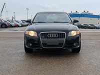 This pre-owned 2008 Audi A4 2.0T offers a timeless design with a sleek black exterior paired with a... (image 9)