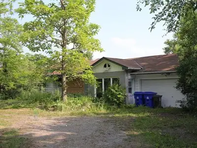 PARTIALLY BURNED HOUSE --Beautifull residential lot of over 38,000 sq. ft. located in a quiet area o...