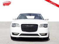 This 2022 Chrysler 300 Touring L is a sleek sedan with stylish white exterior and luxurious black in... (image 1)