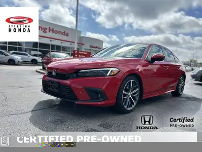 Experience the thrill of driving the 2023 Honda Civic Sedan Touring, a certified pre-owned beauty wi...