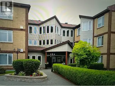 Welcome to 25 Tiffany Lane - Unit 200. This Two bedroom condo offers one full and one half bathroom...