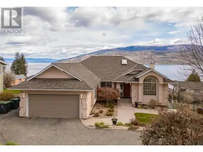 Welcome to this lovely five-bedroom rancher walkout, perfectly positioned to capture breathtaking la...