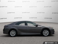 This 2023 Toyota Camry SE offers a compelling blend of style, comfort, and technology. Its sleek gra... (image 7)