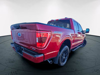 Experience the power and versatility of the 2021 Ford F-150 XLT in a striking red finish with a robu... (image 7)
