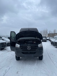 black-on-black Mercedes-Benz Sprinter van. This well-maintained vehicle offers a blend of luxury and... (image 6)