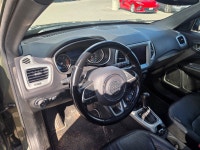 Experience confident adventure with the 2021 Jeep Compass North in striking blue, designed for those... (image 8)