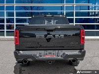 This Ram 1500 has a dependable Twin Turbo Premium Unleaded I-6 3.0 L/183 engine powering this Automa... (image 4)