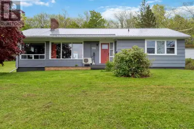 Set on approximately 0.5 acres with views of the Annapolis Basin, 700 Highway 1 in Deep Brook offers...