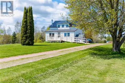 4-Bedroom Country Home on Approx. 18 Acres Fixer-Upper with Huge Potential! This spacious 4-bedroom...