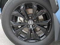 The highly anticipated 2025 Toyota RAV4 Hybrid XSE, a striking light blue Sport Utility with a sophi... (image 8)