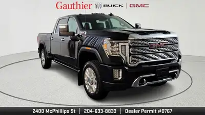 The 2022 GMC Sierra 2500HD Denali blends heavy-duty capability with luxury-truck refinement. With th...